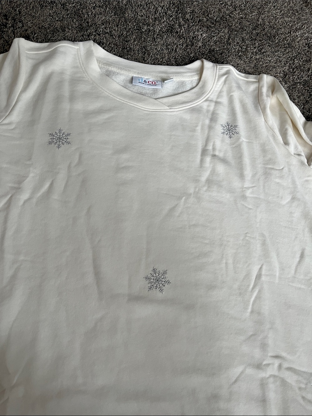 Denim & Co sweatshirt - not heavy. Cute beige w/silver embroidered snowflakes.